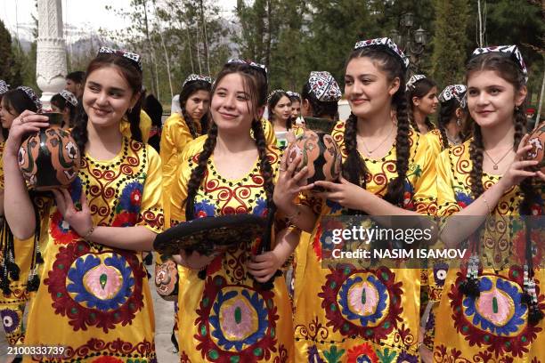 Tajiks celebrate Navruz , an ancient festival marking the first day of spring in Central Asia, in Dushanbe on March 23, 2024.