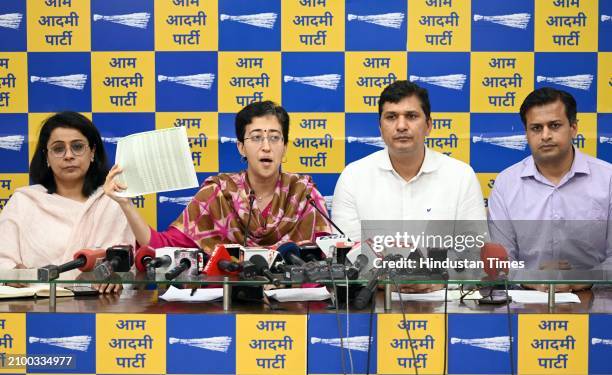 Delhi AAP Government Cabinet Ministers Atishi Singh, with Saurabh Bhardwaj and leader Priyanka Kakkar with Jasmine Shah during a press conference at...