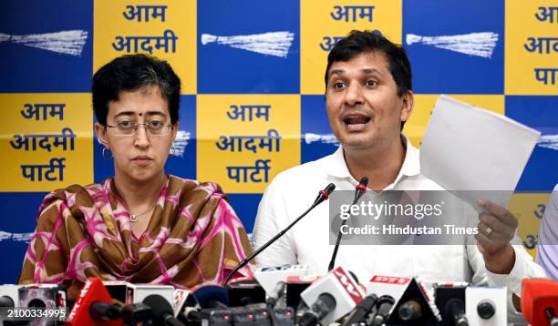 Delhi AAP Government Cabinet Ministers Atishi Singh, with Saurabh Bhardwaj during a press conference at party headquarter, on March 23, 2024 in New...