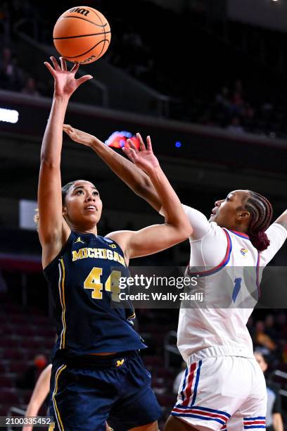 Cameron Williams of the Michigan Wolverines got up for a shot while Taiyanna Jackson of the Kansas Jayhawks defends during the first quarter of the...