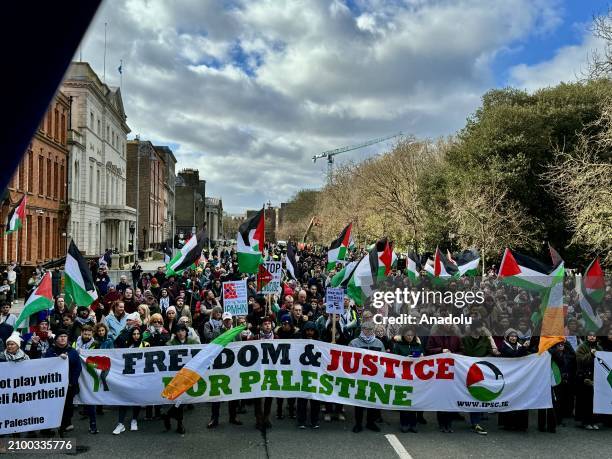 People gather to stage Pro-Palestinian demonstration as they march to demand an immediate ceasefire in Gaza and to show solidarity with the...