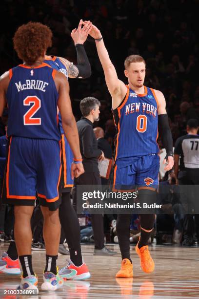 Donte Divincenzo of the New York Knicks celebrates during the game against the Brooklyn Nets on March 23, 2024 at Madison Square Garden in New York...