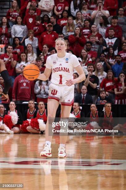 Lexus Bargesser of the Indiana Hoosiers brings the ball up the court during the first round of the 2024 NCAA Women's Basketball Tournament held at...