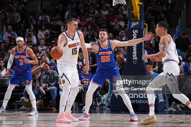 Nikola Jokic of the Denver Nuggets handles the ball during the game against the New York Knicks on March 21, 2024 at the Ball Arena in Denver,...