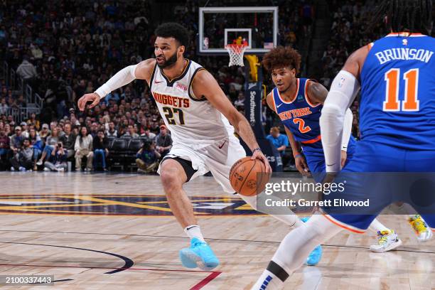 Jamal Murray of the Denver Nuggets drives to the basket during the game against the New York Knicks on March 21, 2024 at the Ball Arena in Denver,...