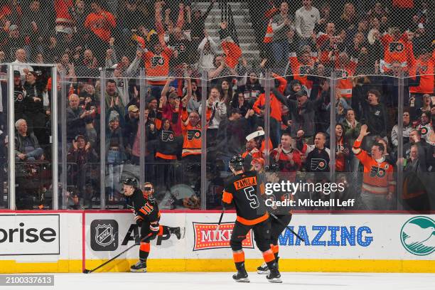 Travis Konecny of the Philadelphia Flyers reacts after scoring a goal against the Boston Bruins in the third period at the Wells Fargo Center on...