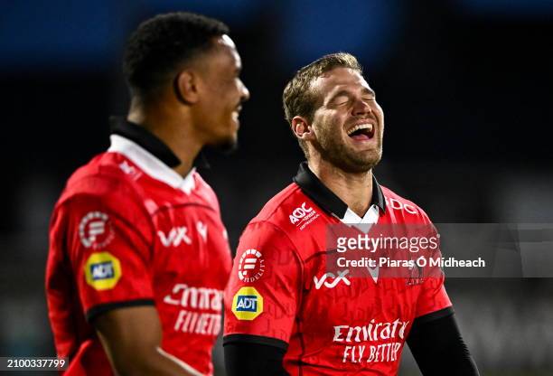 Galway , Ireland - 23 March 2024; Emirates Lions players Hanru Sirgel, right, and Darrien Landsberg celebrates after their side's victory in the...