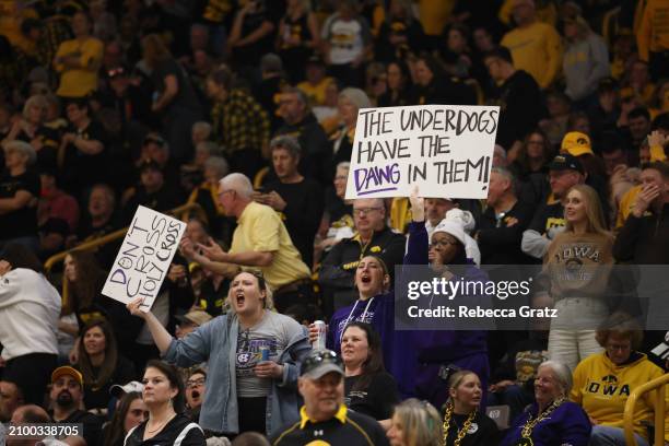 Holy Cross Crusaders fans cheer as the Crusaders women's basketball team play the Iowa Hawkeyes during the first round of the 2024 NCAA Women's...