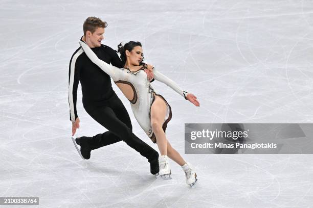 Madison Chock and Evan Bates of the United States compete in the Ice Dance Free Dance during the ISU World Figure Skating Championships at the Bell...