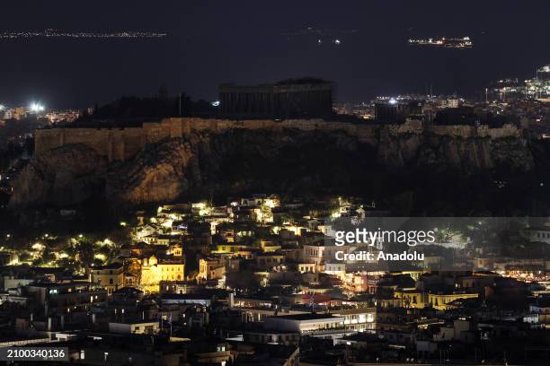 View of the ancient Parthenon Temple during the Earth Hour in Athens, Greece on March 23, 2024. The symbolic 'lights off' is back as part of the...
