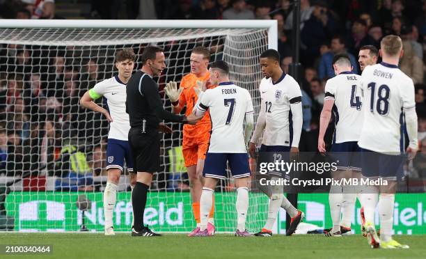 England players look frustrated with the Referee during the international friendly match between England and Brazil at Wembley Stadium on March 23,...