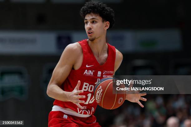 Bourg-en-Bresse's French forward Zaccharie Risacher prepares to shoot the ball during the French Ligue Nationale de Basket Pro A match between...