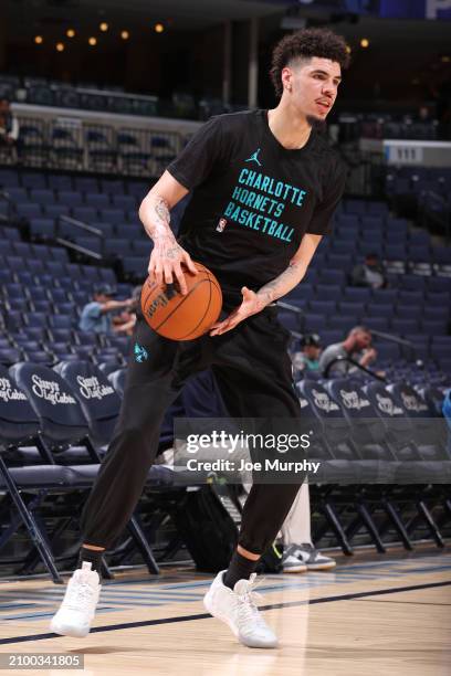 LaMelo Ball of the Charlotte Hornets warms up before the game against the Memphis Grizzlies on March 13, 2024 at FedExForum in Memphis, Tennessee....