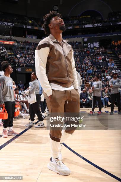 Marcus Smart of the Memphis Grizzlies looks on during the game against the Charlotte Hornets on March 13, 2024 at FedExForum in Memphis, Tennessee....