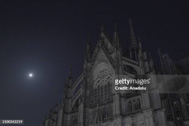 View of Cologne Cathedral during the lights are turned off in observance of the Earth Hour environmental campaign in Cologne, Germany on March 23,...
