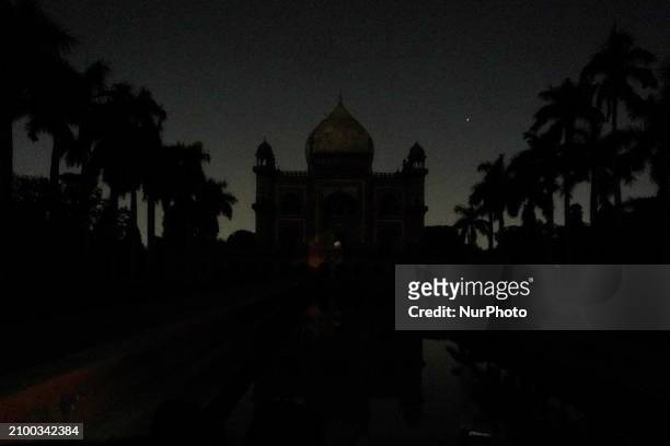 Safdarjung's Tomb is pictured with its lights turned off during the Earth Hour environmental campaign in New Delhi, India, on March 23, 2024.