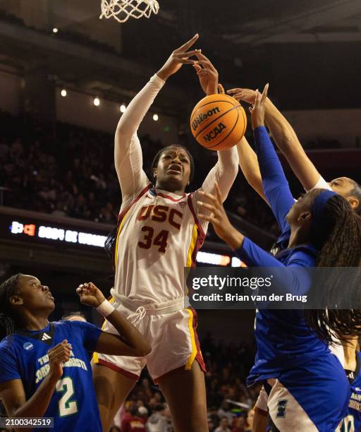Los Angeles, CA USC Clarice Akunwafo battles for a rebound against Texas A&M Corpus Christi defense as the seed USC Trojans play Texas A&M Corpus...