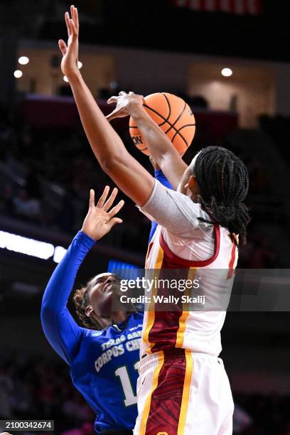 Rayah Marshall of the USC Trojans blocks a shot by Paige Allen of the Texas A&M Corpus Christi Islanders during the first round of the 2024 NCAA...