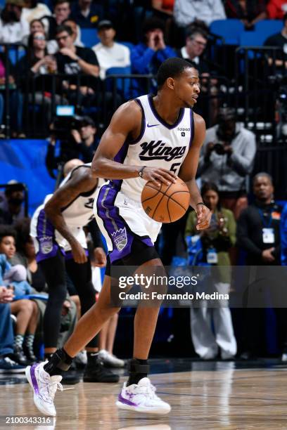 De'Aaron Fox of the Sacramento Kings dribbles the ball during the game against the Orlando Magic on March 23, 2024 at the Kia Center in Orlando,...