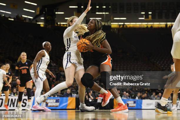 Tabitha Amanze of the Princeton Tigers moves to the basket against the West Virginia Mountaneers during the first round of the 2024 NCAA Women's...