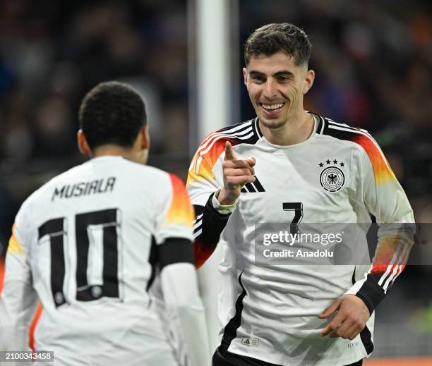 Kai Havertz of Germany celebrates after scoring during the international friendly football match between France and Germany at Groupama Stadium in...