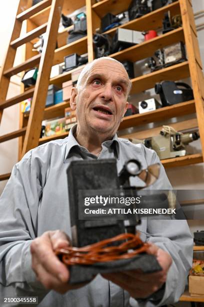 Ferenc Biro, filmstrip collector and owner of the Virtual Museum of Slide Film shows their museum objects in Budapest on February 18 as the Hungarian...