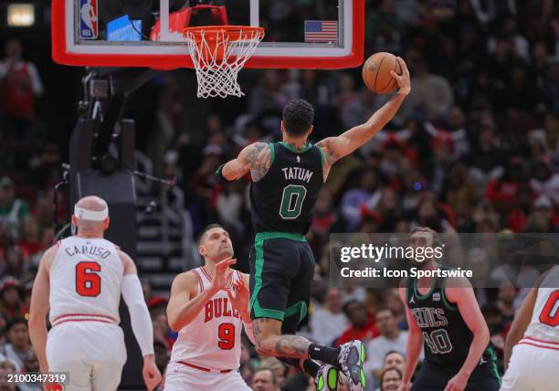Jayson Tatum of the Boston Celtics drives to the basket for a layup during the second half against the Chicago Bulls at the United Center on March...