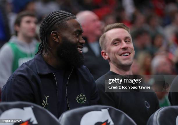 Jaylen Brown of the Boston Celtics looks on form the bench during the second half against the Chicago Bulls at the United Center on March 23, 2024 in...