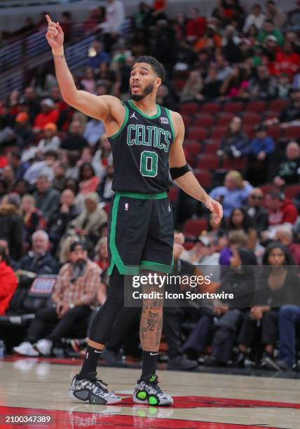Jayson Tatum of the Boston Celtics calls to the bench to challenge a call during the second half against the Chicago Bulls at the United Center on...