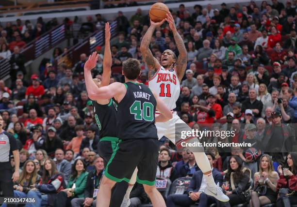 DeMar DeRozan of the Chicago Bulls is fouled shooting the ball during the second half against the Boston Celtics at the United Center on March 23,...
