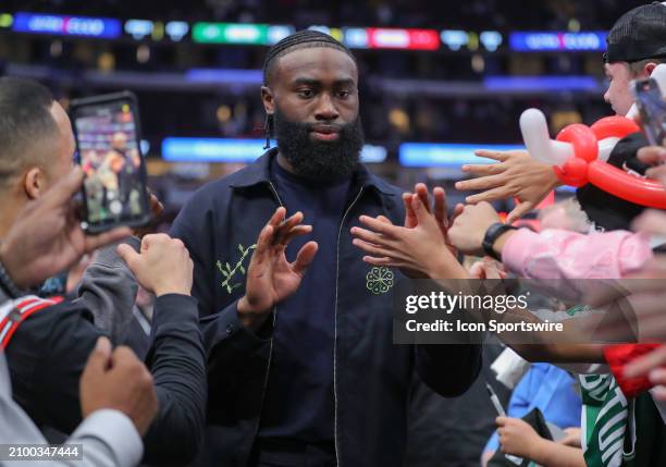 Jaylen Brown of the Boston Celtics looks on as he walks back to the locker room after a game against the Chicago Bulls at the United Center on March...
