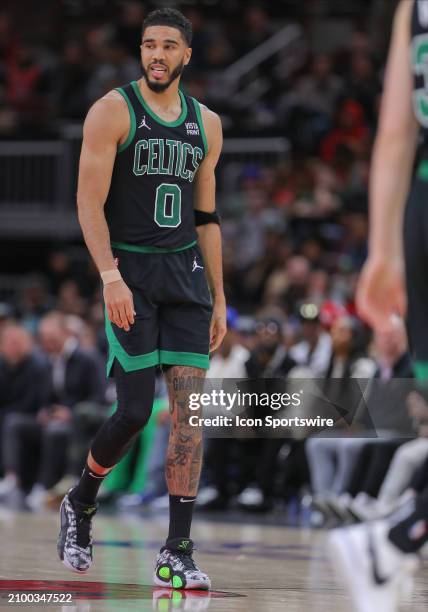 Jayson Tatum of the Boston Celtics looks on during the second half against the Chicago Bulls at the United Center on March 23, 2024 in Chicago,...