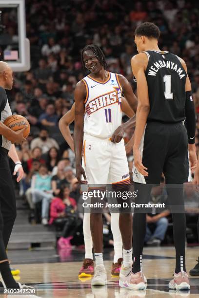 Bol Bol of the Phoenix Suns smiles during the game against the San Antonio Spurs on March 23, 2024 at the Frost Bank Center in San Antonio, Texas....