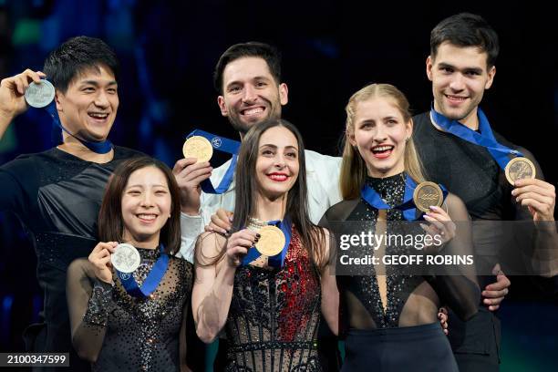 Gold medalists Deanna Stellato-Dudek and Maxime Deschamps of Canada pose with silver medalists Riku Miura and Ryuichi Kihara of Japan and bronze...