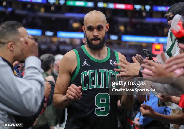 Derrick White of the Boston Celtics looks on as he walks back to the locker room after a game against the Chicago Bulls at the United Center on March...