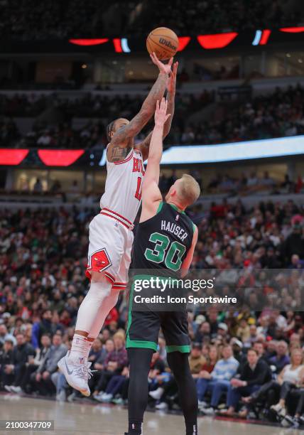 DeMar DeRozan of the Chicago Bulls shoots the ball over Sam Hauser of the Boston Celtics during the second half at the United Center on March 23,...