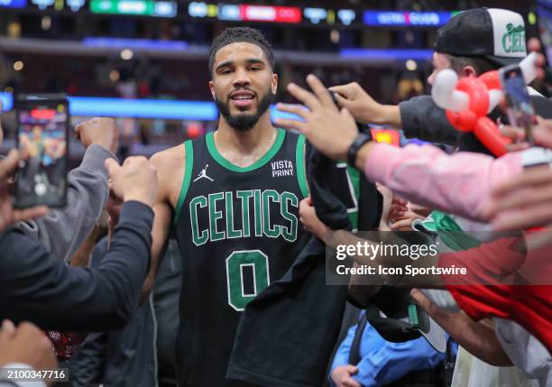 Jayson Tatum of the Boston Celtics looks on as he walks back to the locker room after a game against the Chicago Bulls at the United Center on March...