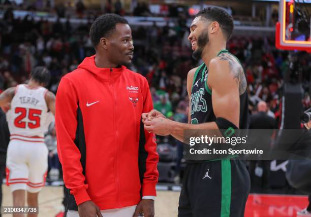 Javonte Green of the Chicago Bulls and Jayson Tatum of the Boston Celtics chat after a game at the United Center on March 23, 2024 in Chicago,...