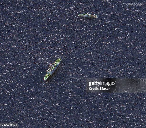Maxar satellite imagery closer view of Chinese coast guard ship near the Second Thomas Shoal. Please use: Satellite image 2024 Maxar Technologies.