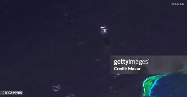 Maxar satellite imagery of overview of ship confrontation northeast of Second Thomas Shoal. Please use: Satellite image 2024 Maxar Technologies.