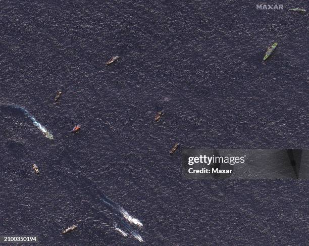 Maxar satellite imagery of Chinese and Philippines vessels confrontation near the Second Thomas Shoal. Please use: Satellite image 2024 Maxar...