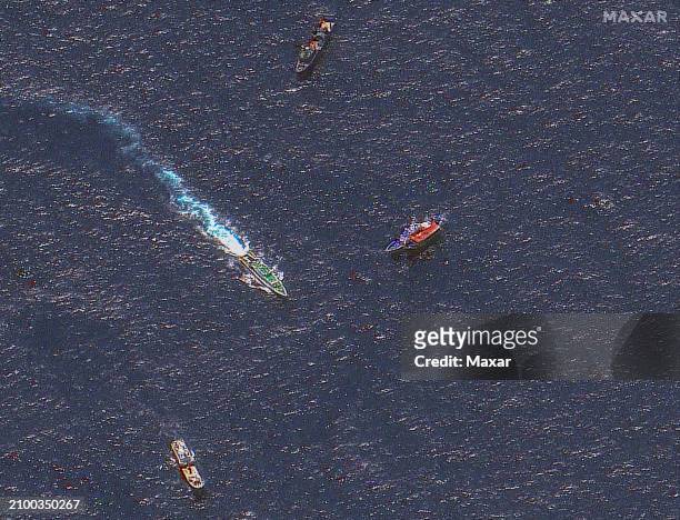 Maxar satellite imagery of Chinese coast guard ship and philippines resupply ship near the Second Thomas Shoal. Please use: Satellite image 2024...