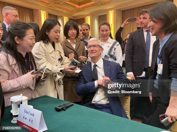 Tim Cook, chief executive officer of Apple Inc., at the China Development Forum 2024 in Beijing, China, on Sunday, March 24, 2024. China's bid to woo...