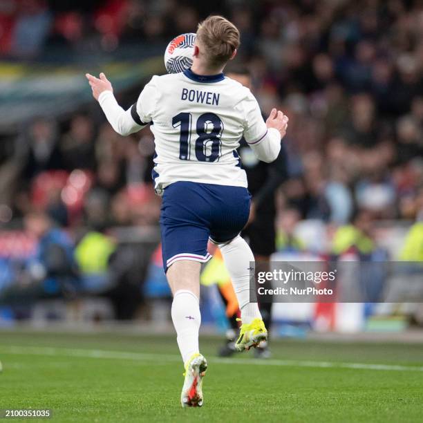 Jarrod Bowen, wearing the jersey for England, is chesting the ball during the International Friendly match between England and Brazil at Wembley...