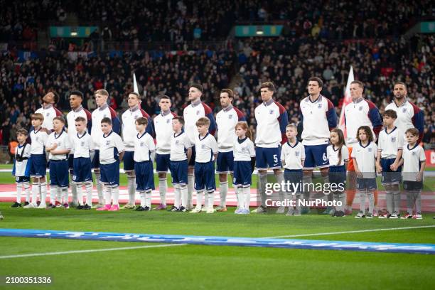 The England squad is standing during the National Anthem at the International Friendly match between England and Brazil at Wembley Stadium in London,...