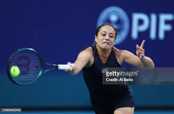Elisabetta Cocciaretto of Italy returns a shot against Naomi Osaka of Japan during their match on Day 5 of the Miami Open at Hard Rock Stadium on...