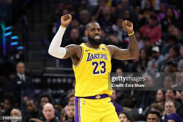 LeBron James of the Los Angeles Lakers reacts during their game against the Sacramento Kings at Golden 1 Center on March 13, 2024 in Sacramento,...