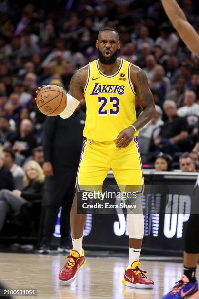 LeBron James of the Los Angeles Lakers reacts during their game against the Sacramento Kings at Golden 1 Center on March 13, 2024 in Sacramento,...