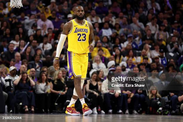 LeBron James of the Los Angeles Lakers stands on the court during their game against the Sacramento Kings at Golden 1 Center on March 13, 2024 in...