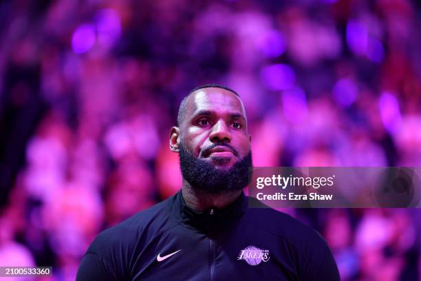 LeBron James of the Los Angeles Lakers stands on the court for the national anthem before their game against the Sacramento Kings at Golden 1 Center...